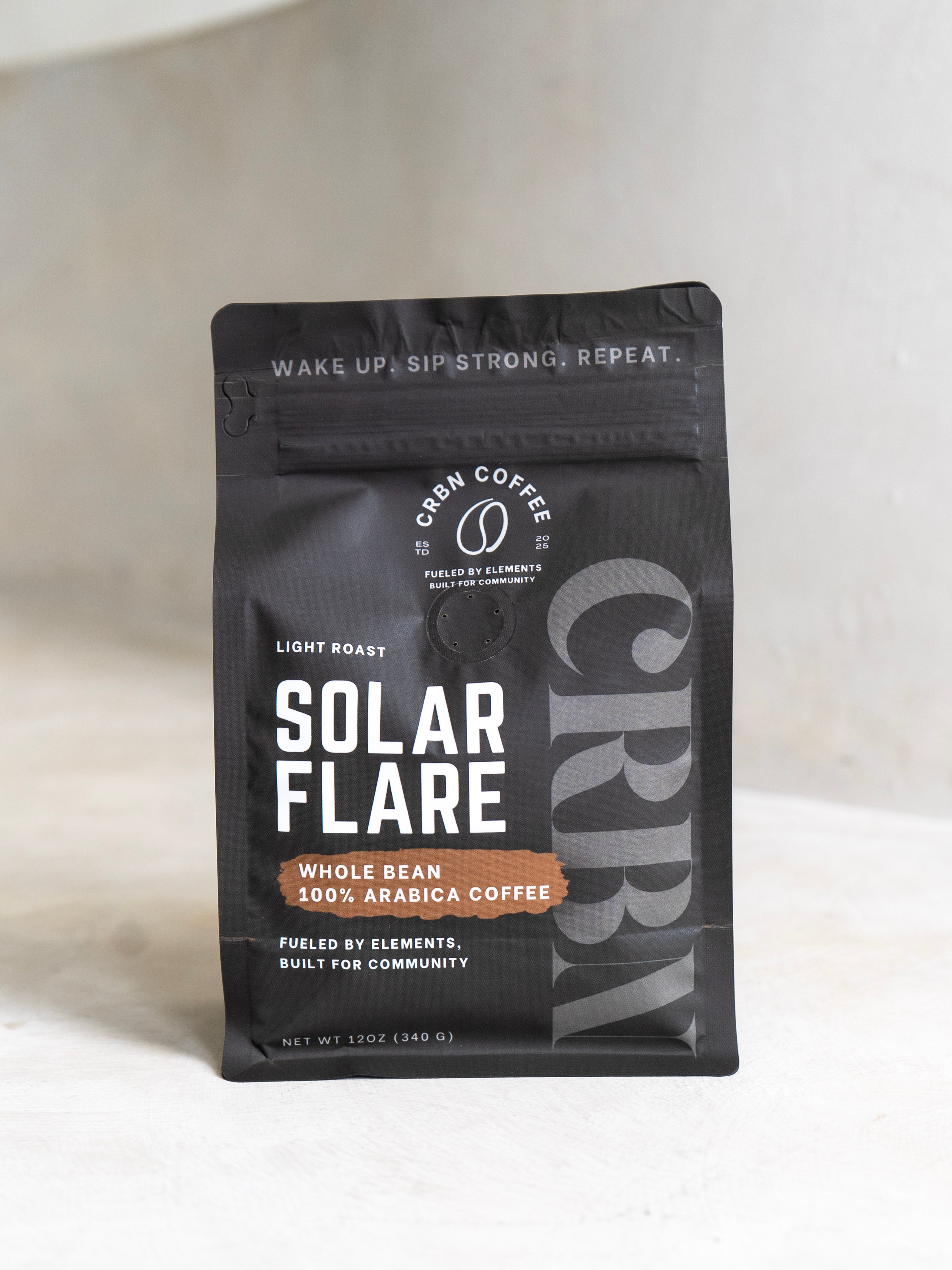 Coffee package labeled 'Solar Flare' by CRBY on a light background