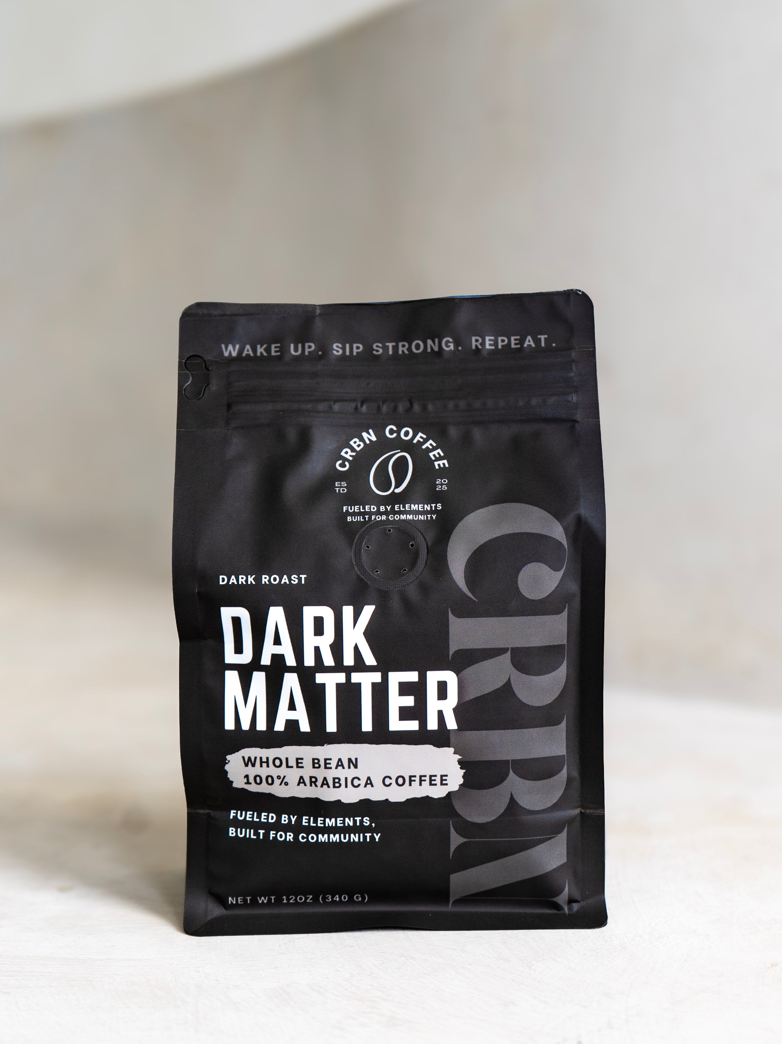 Coffee package labeled 'Dark Matter' on a light background